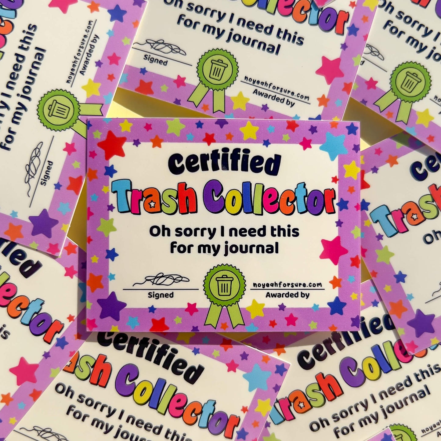Colorful 'Certified Trash Collector' certificates with star designs on a multicolored background.