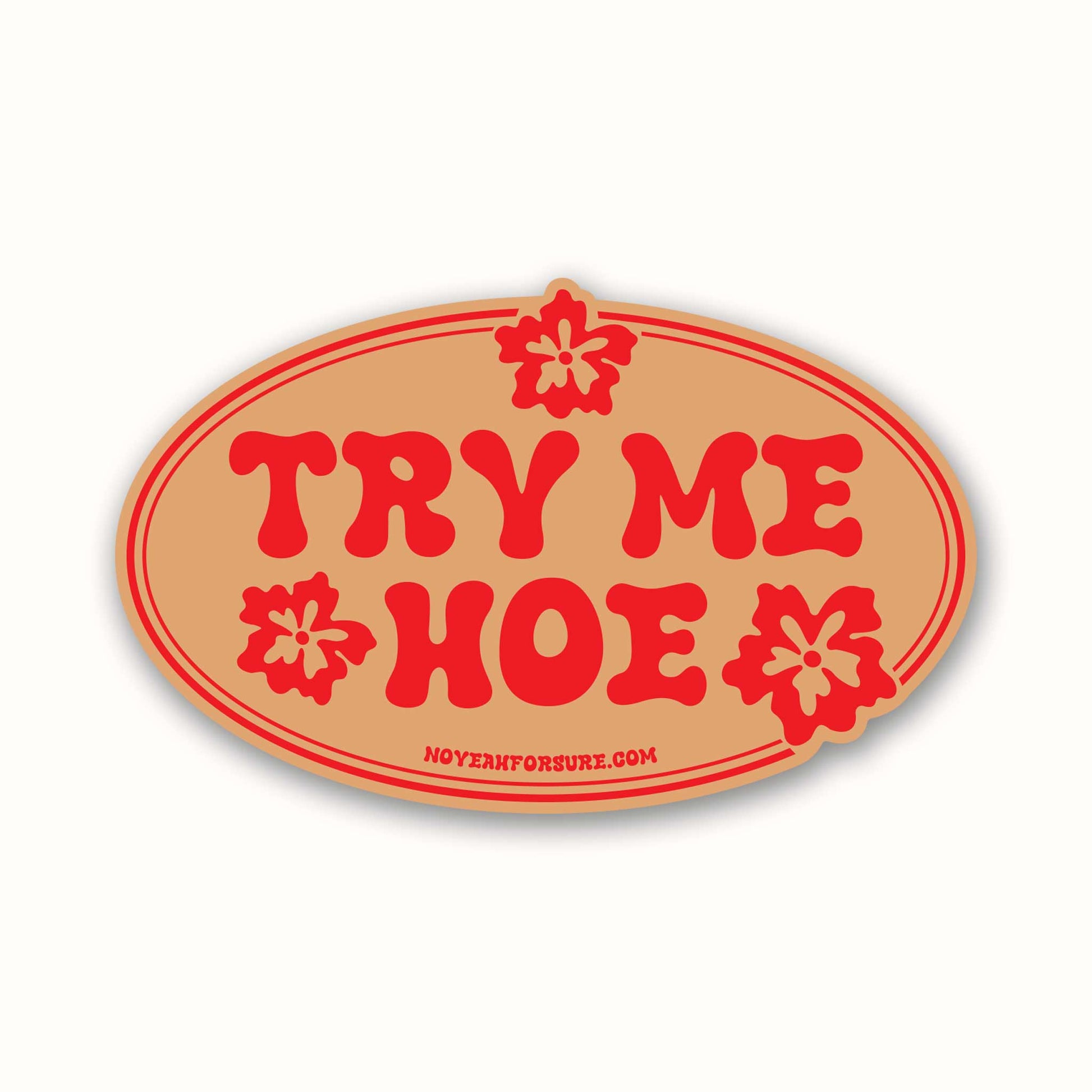 Oval-shaped sign with red text 'TRY ME HOE' on a beige background