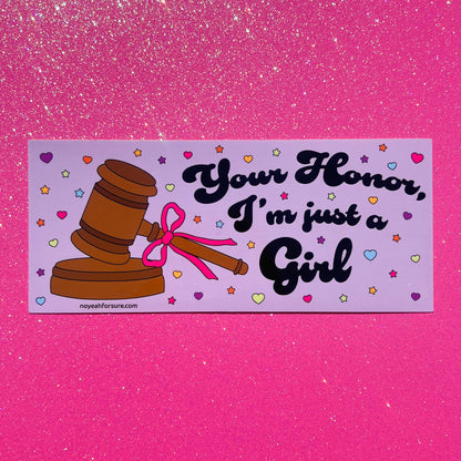 Sticker with a gavel and pink bow on a purple background with text 'Your Honor, I'm just a Girl' against a pink glittery background.