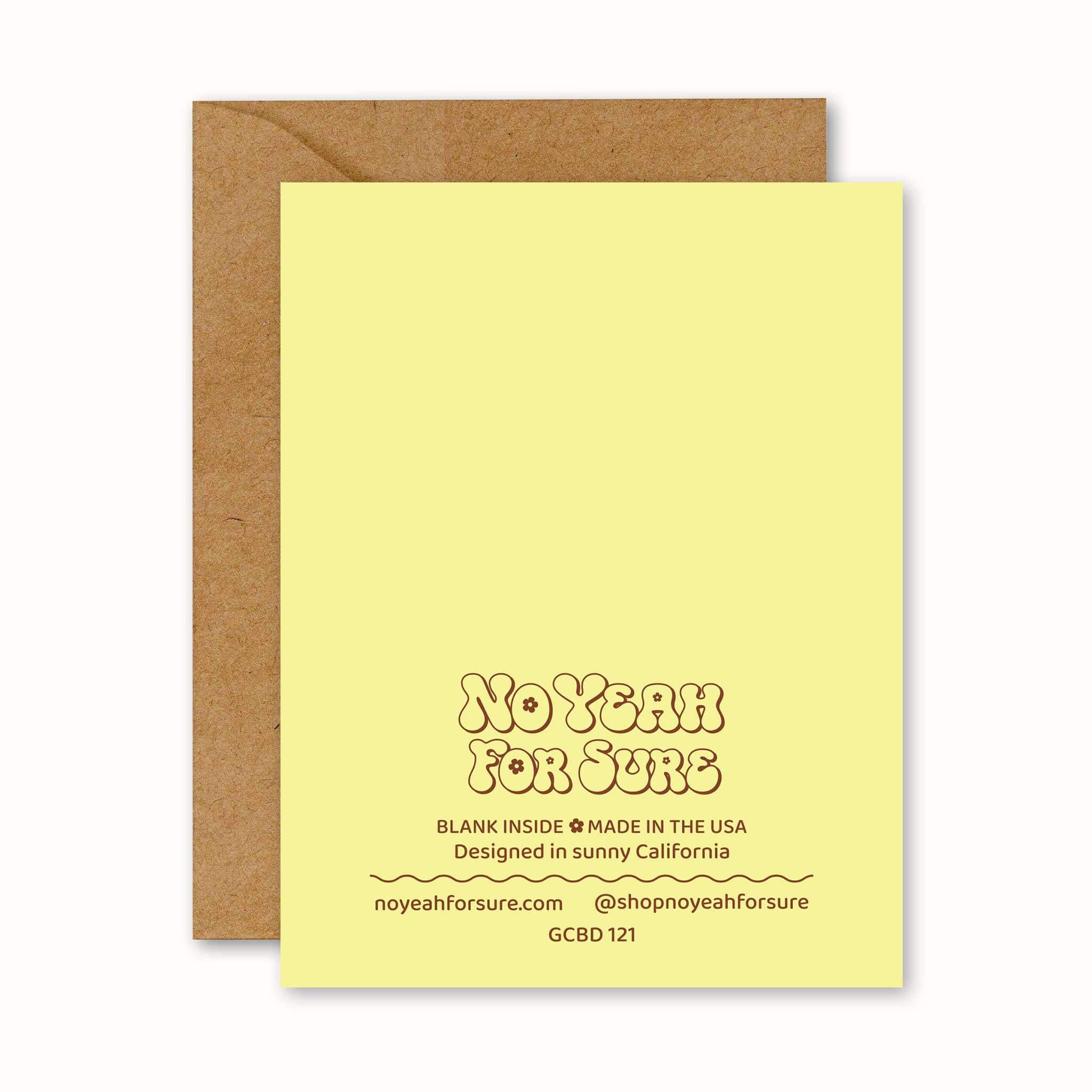 Yellow greeting card with brown envelope on a white background
