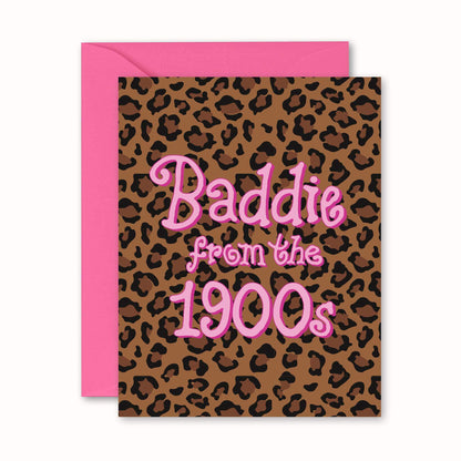 A leopard print greeting card with a pink envelope behind it, pink text that reads 'Baddie from the 1900s'.