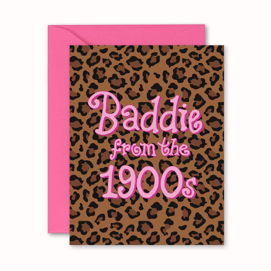 A leopard print greeting card with a pink envelope behind it, pink text that reads 'Baddie from the 1900s'.