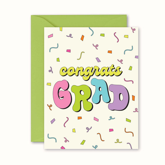 Graduation card with colorful 'congrats GRAD' text and green envelope on a white background