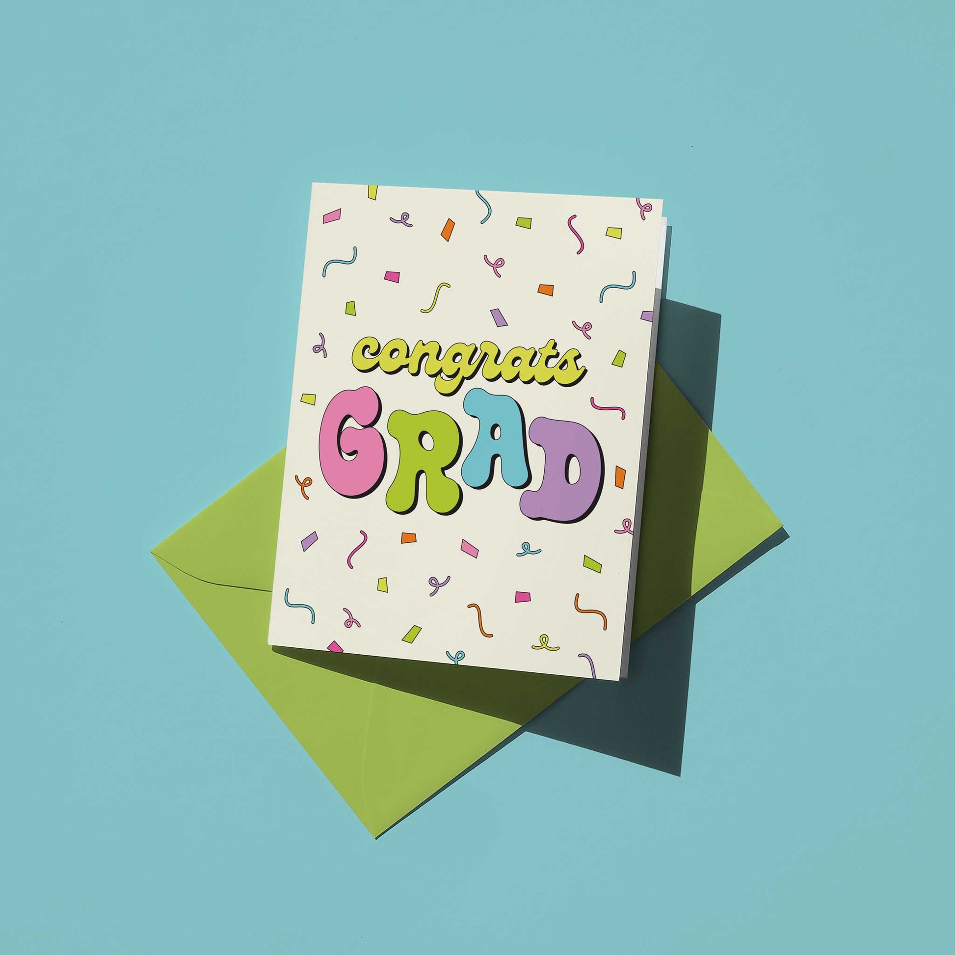 Graduation card with colorful text on a blue background