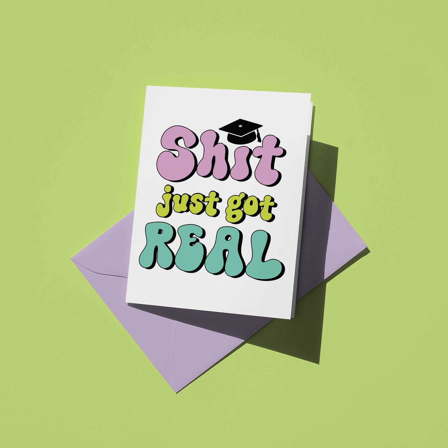 Card with 'Shit just got REAL' text and a graduation cap on a green background
