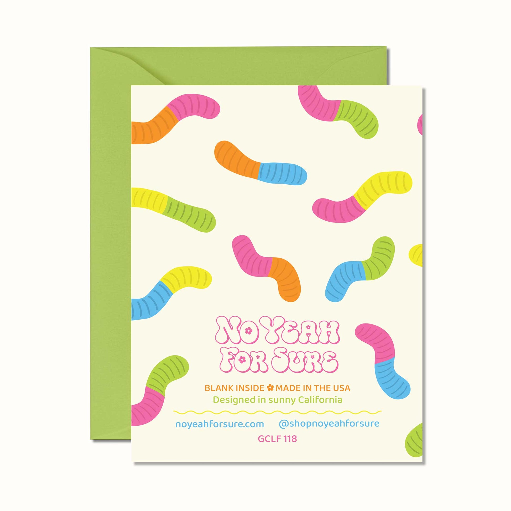 Greeting card with colorful worm pattern and green envelope on a white background
