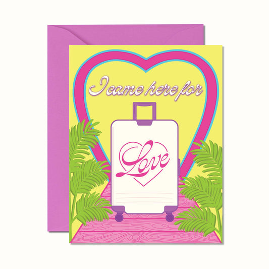 Greeting card with heart design, suitcase illustration, and 'I came here for love' text on a yellow background.