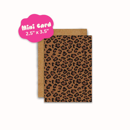 A leopard print mini greeting card with a brown kraft envelope, shown on a plain white background with a pink cloud shaped label that reads 'Mini Card 2.5" x 3".
