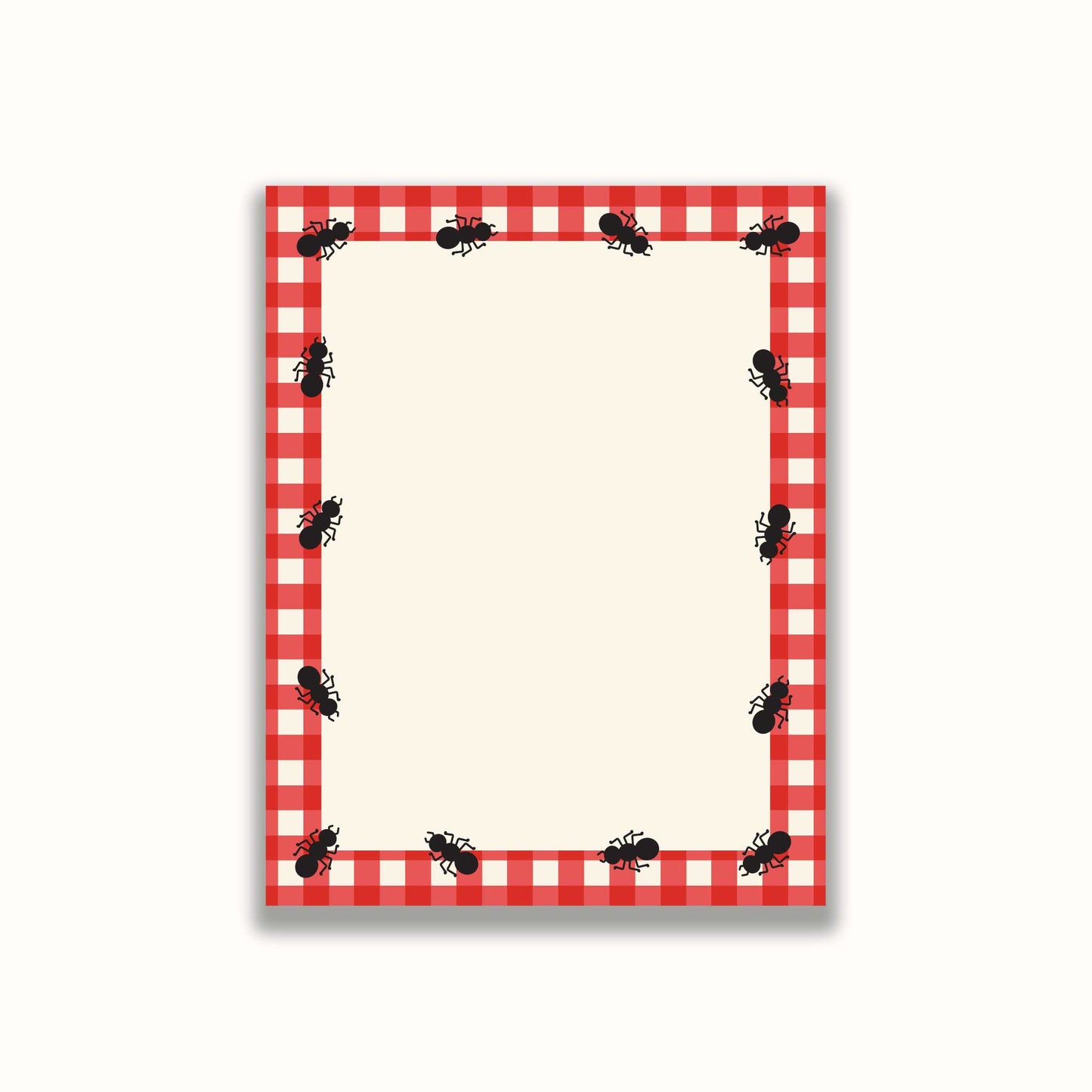 Notepad with red and white checkered border and ants design on a white background