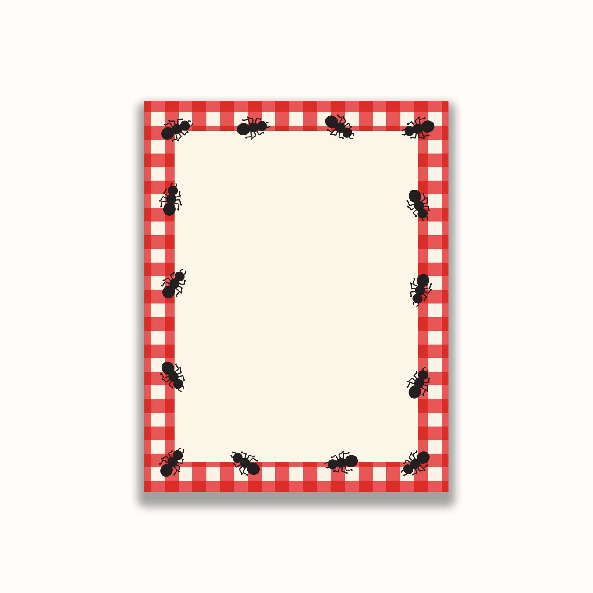 Notepad with red and white checkered border and ants design on a white background