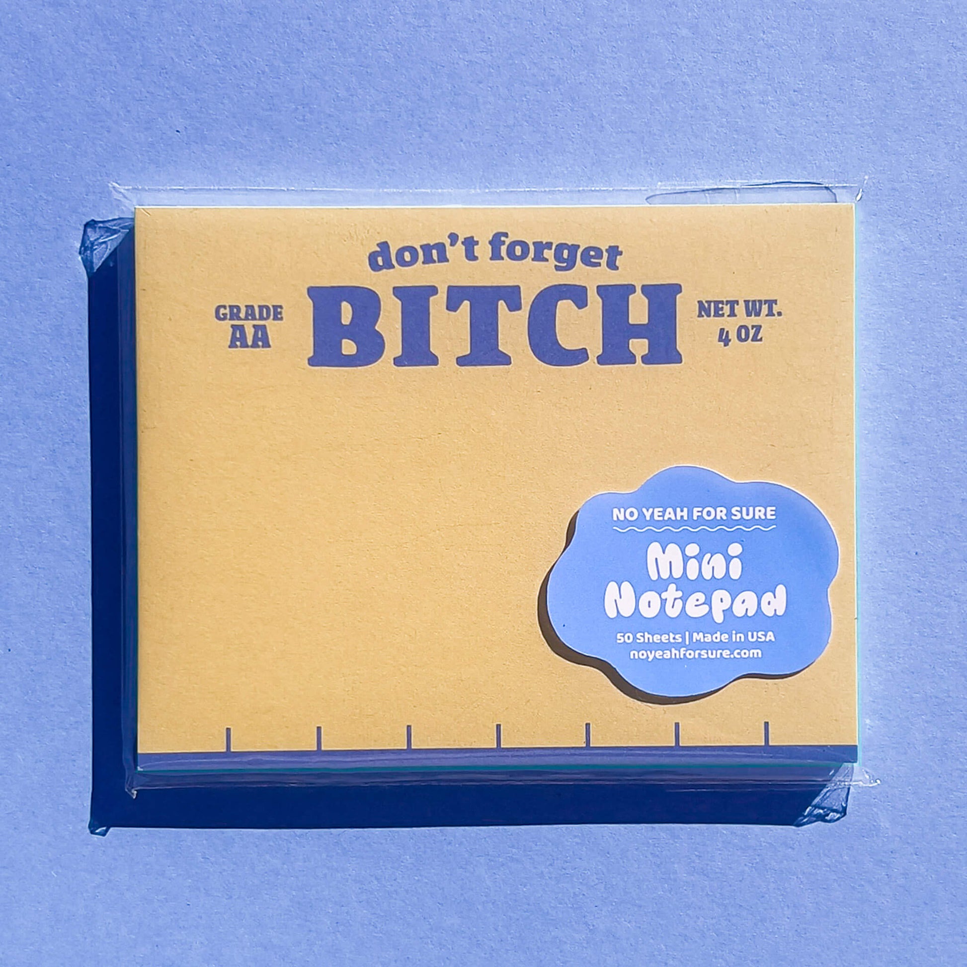 Mini notepad with blue text on a blue background
