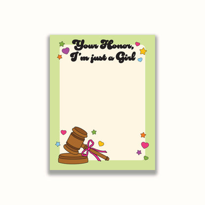 Notebook with a gavel illustration and 'Your Honor, I'm just a Girl' text on a light green cover.