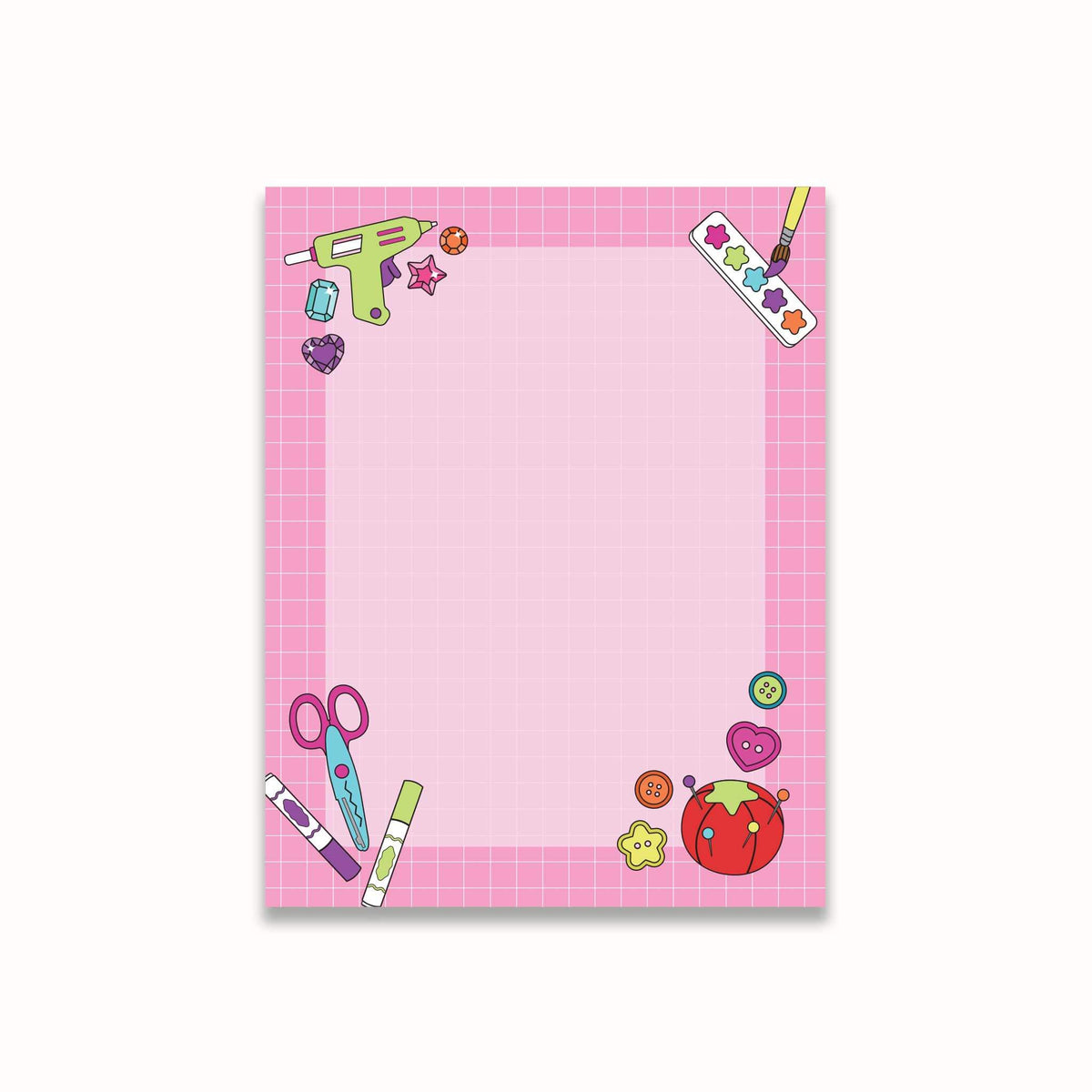 A pink notepad with a grid pattern border and cute craft-themed illustrations in the corners, shown on a clean white background.