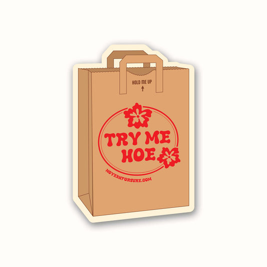 Brown paper bag with red text 'TRY ME HOE' on a white background