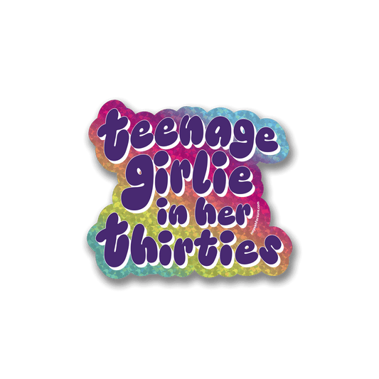 Sticker with decorative text reading "teenage girlie in her thirties" with a gradient multicolored background featuring glitter.