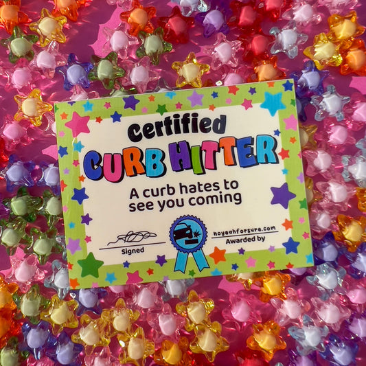 Glossy vinyl sticker with a 'Certified Curb Hitter' design featuring colorful stars and text, resembling an award certificate on a colorful star shaped background.