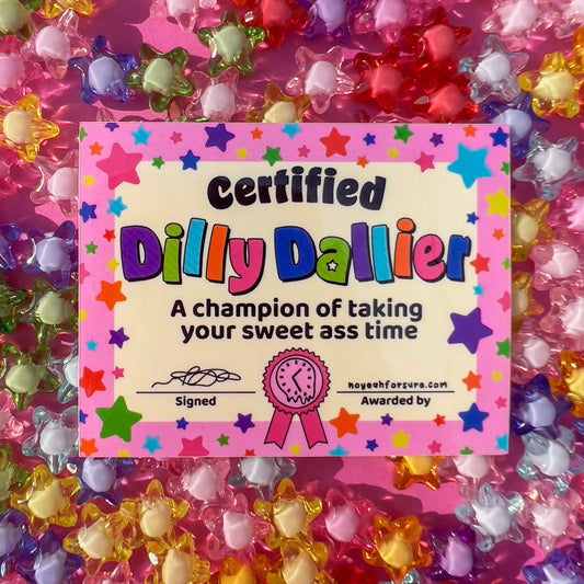 Glossy vinyl sticker with a colorful 'Certified Dilly Dallier' design featuring stars, text, and a signature, resembling an award certificate on colorful star background.