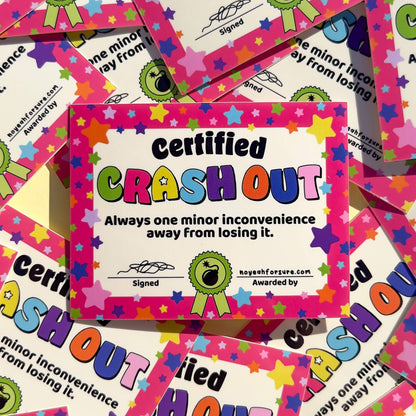 Colorful 'Certified Crashout' certificate sticker with stars and text on a patterned background