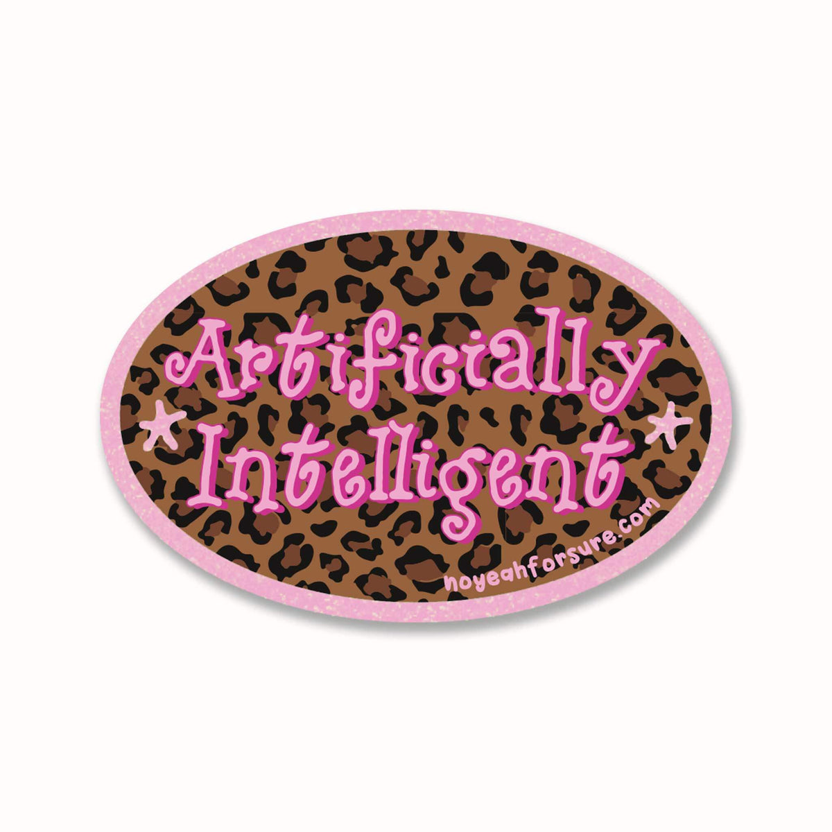 An oval sticker with a pink border and leopard print background, featuring the text 'Artificially Intelligent' in pink cursive with white outlines, and a small website URL at the bottom.