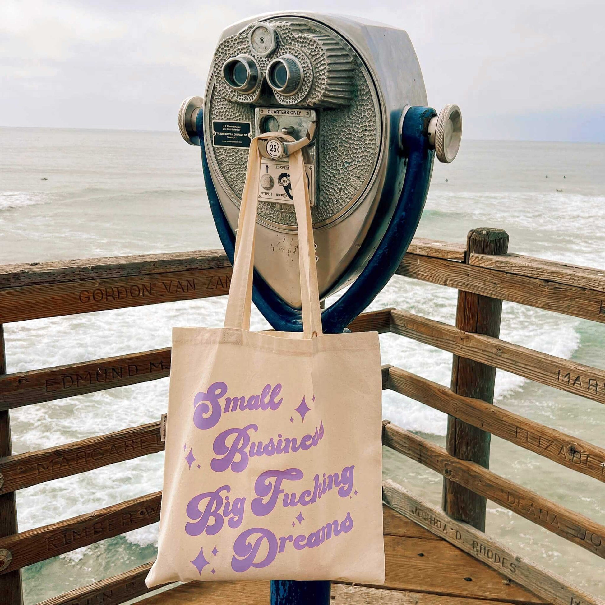 small business big fucking dream tote bag on beach pier